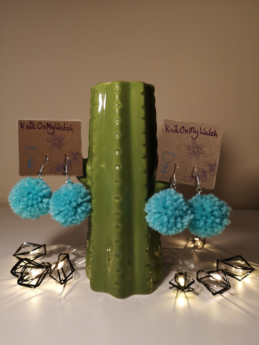 Small turquoise pom pom earrings
