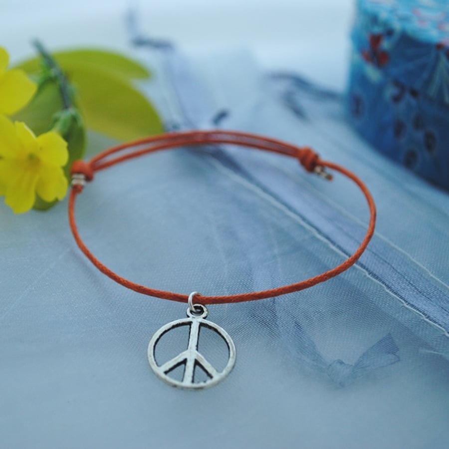 Friendship Bracelet-Orange with silver peace