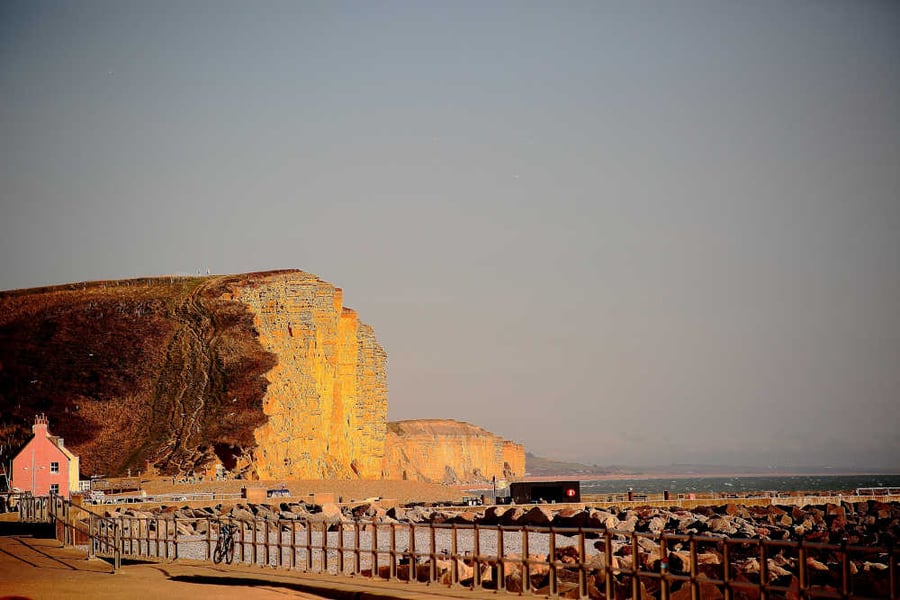 Picture West Bay, the Golden Cliffs
