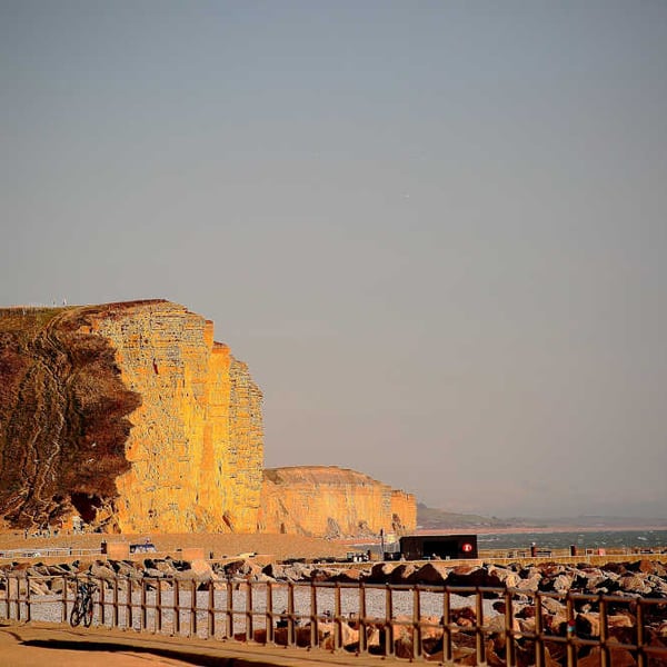 Picture West Bay, the Golden Cliffs