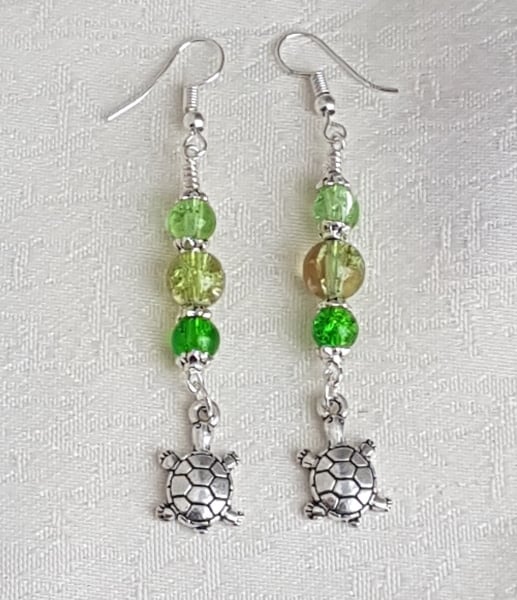 Gorgeous Tortoise Charm Earrings with Green Beads.