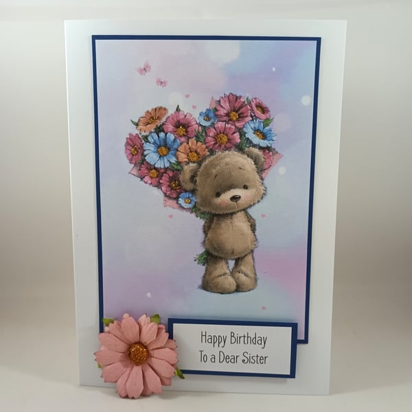 Sister birthday card - cute bear with bouquet of flowers