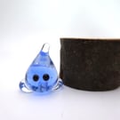 small glass wisp figure