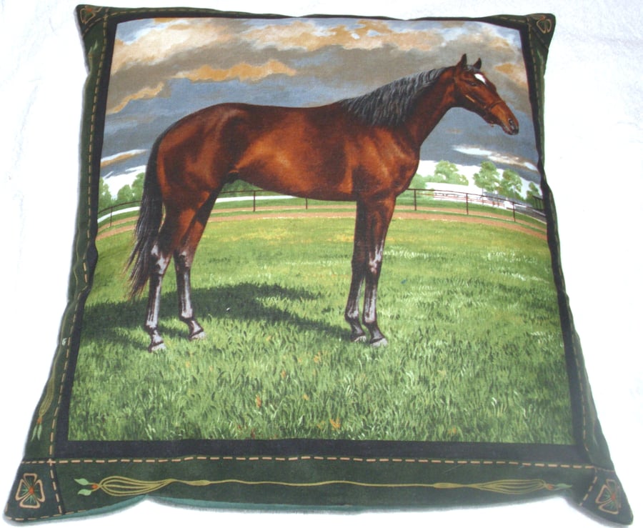 Chestnut Stallion standing in a field cushion