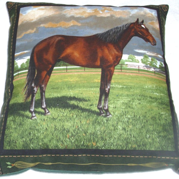 Chestnut Stallion standing in a field cushion