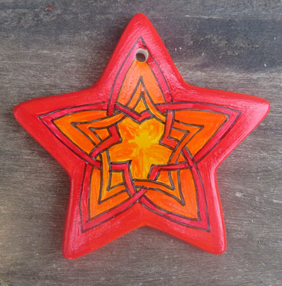 Hand painted ceramic star decoration – Celtic Knot in yellow, orange and red