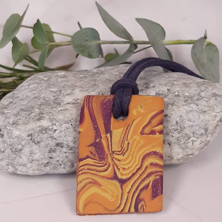 Colourful and sparkly rectangular pendant