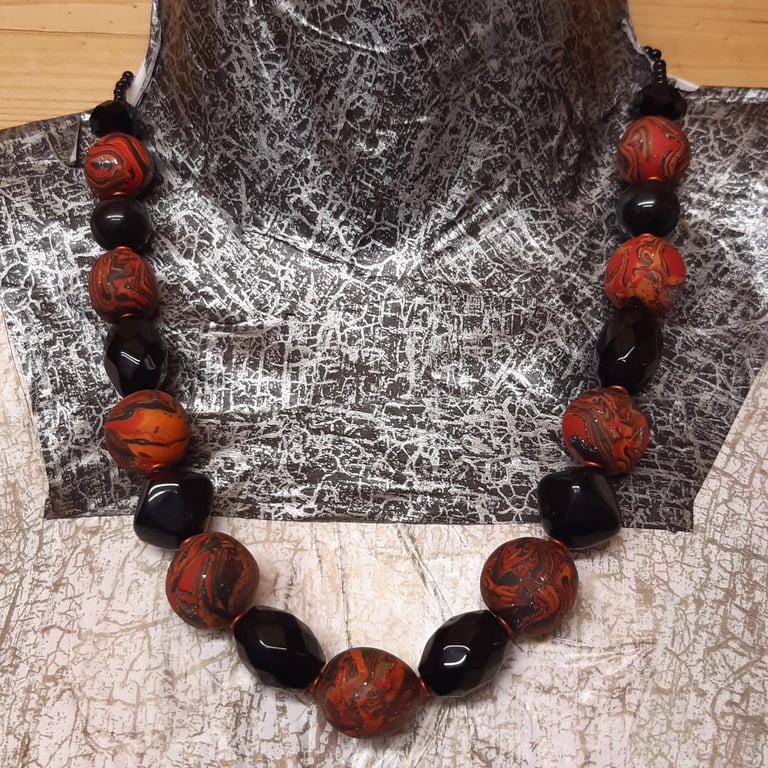Necklace in  orange, red and black sparkle 