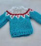 Tiny miniature knit jumper in fine yarn with patterned yoke for the dolls house