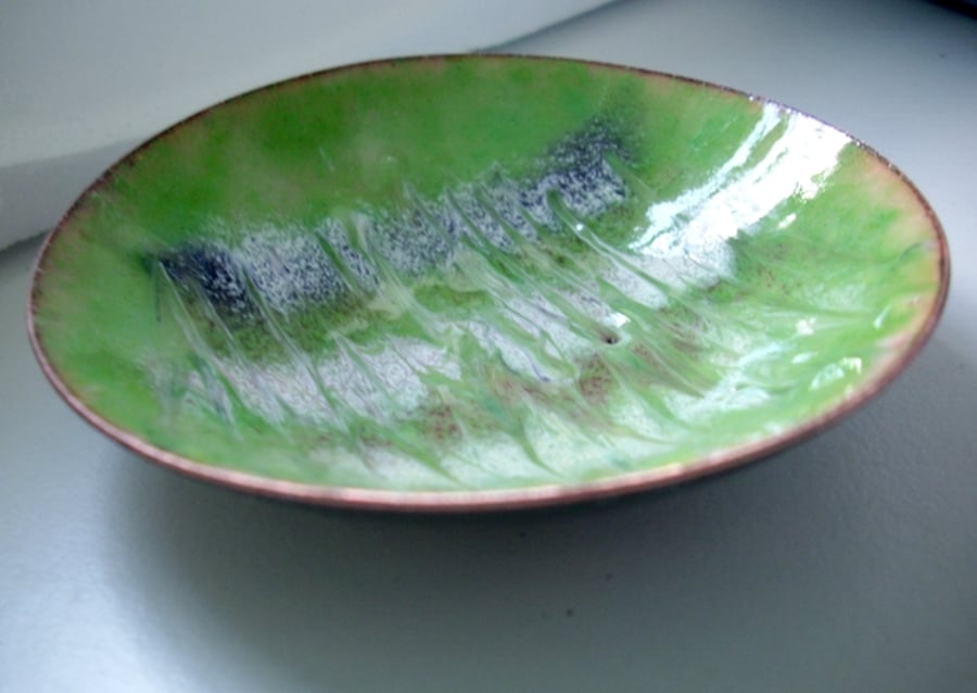 Enamel dish -scrolled brown, white and purple on green over clear enamel