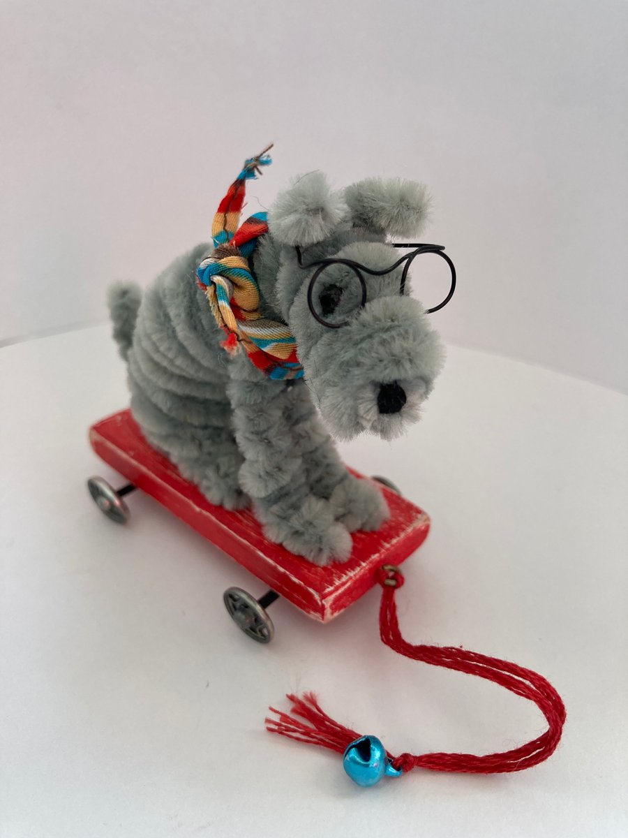 Handmade Miniature Dog on a Pull Along Trolley with Wheels. 