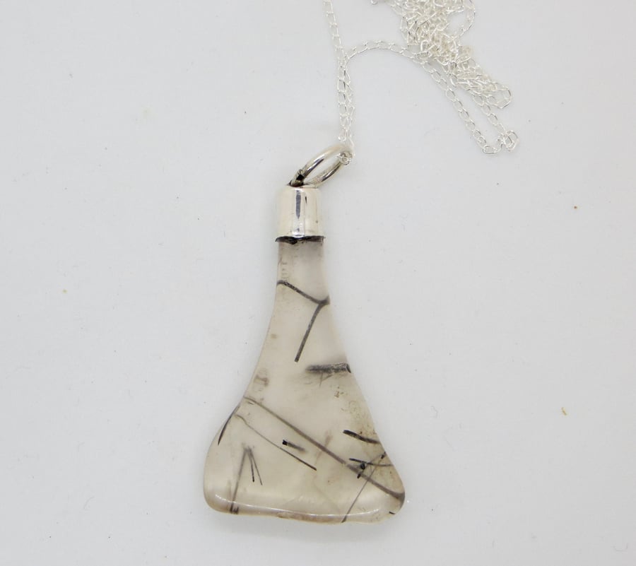 Crystal Pendant with Inclusions, Silver Mount and Chain