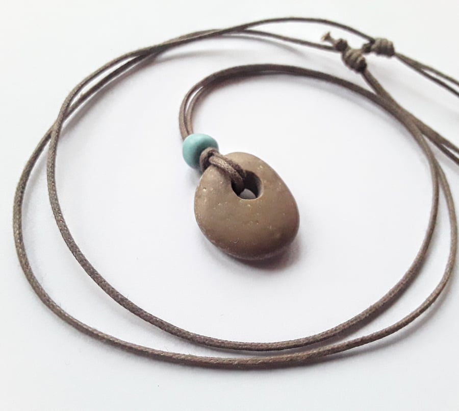 Beautifully Simple Long Pebble Pendant with Turquoise Bead