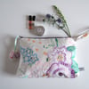 Toiletries, make up or clutch bag made from  vintage hand embroidery.