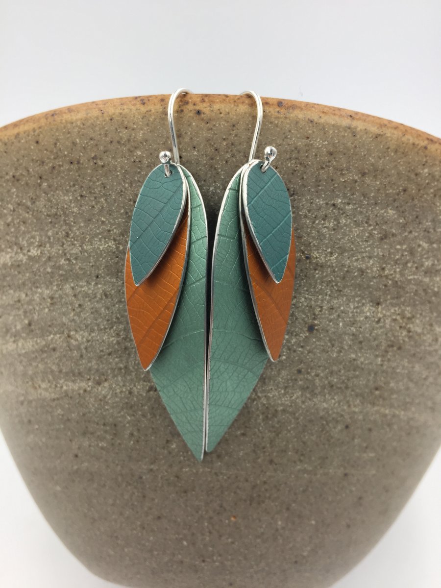 Teal and orange anodised aluminium parrot wing dangly earrings