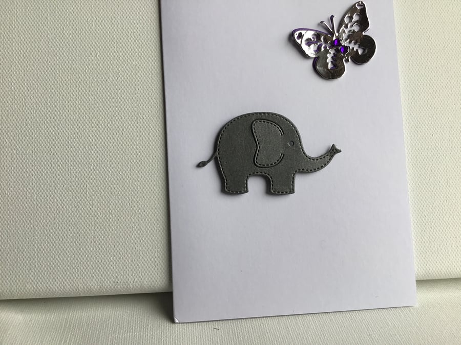 A cute elephant with butterfly any occasion card. CC312