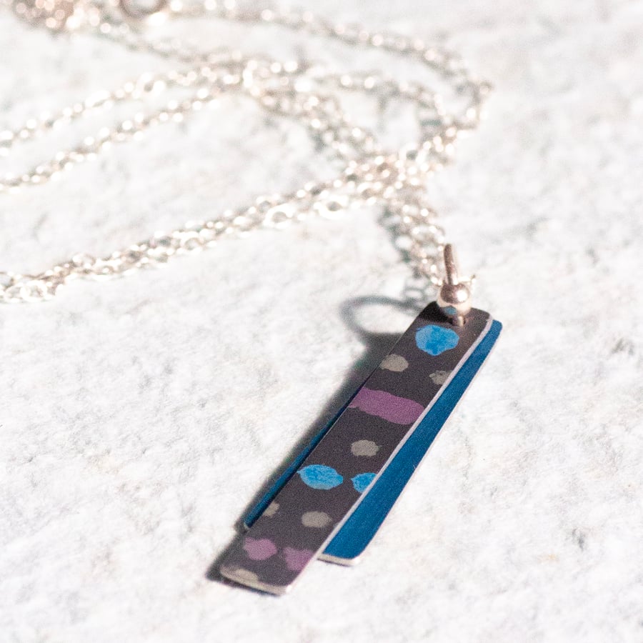 Dragonfly inspired anodised aluminium pendant