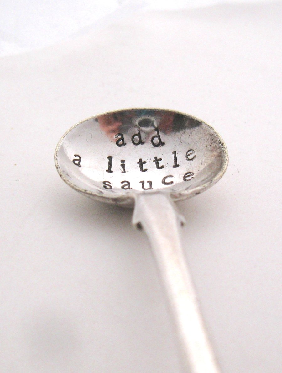 Add a little sauce, stamped condiment spoon