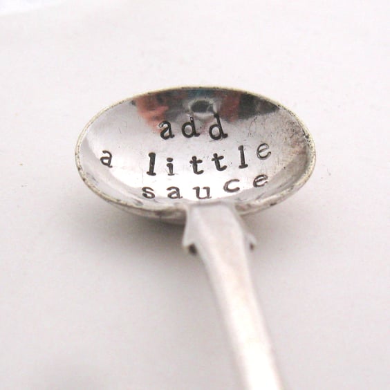 Add a little sauce, stamped condiment spoon