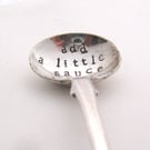 Add a little sauce, stamped condiment spoon