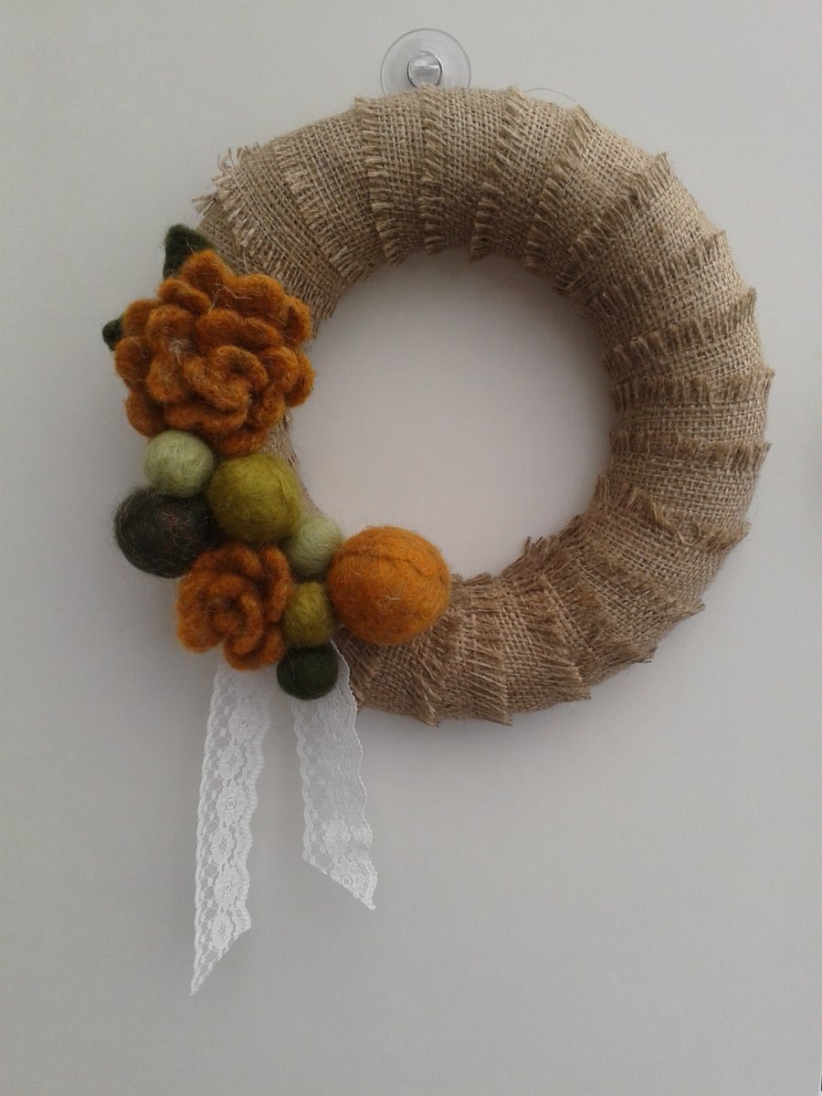 Green and gold felt and hessian decorative wreath