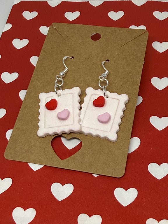 Polymer clay heart stamp dangly earrings
