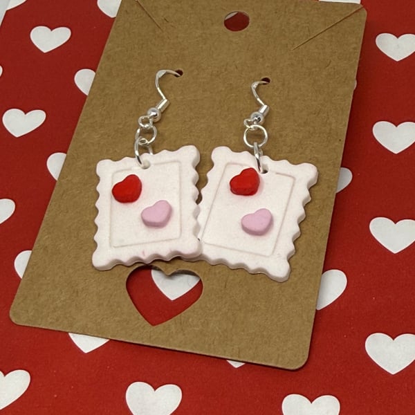 Polymer clay heart stamp dangly earrings