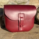Red leather bag with shoulder strap