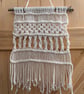 White macrame wall hanging