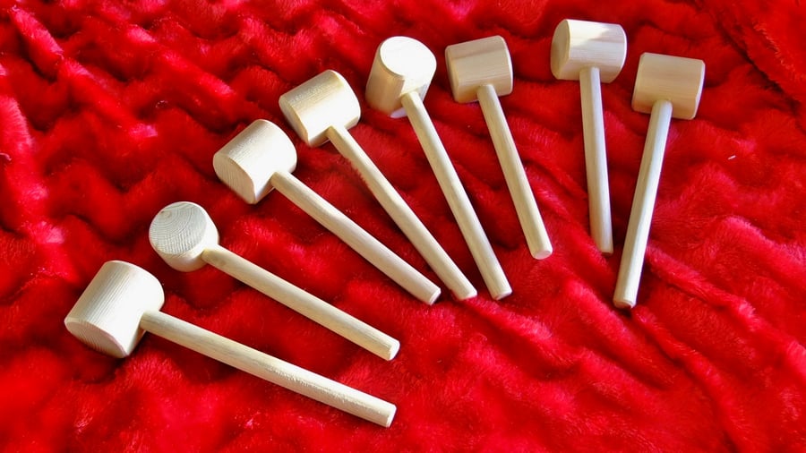 Baby or young child wooden toy mallet or hammer for playroom playshool nursery.