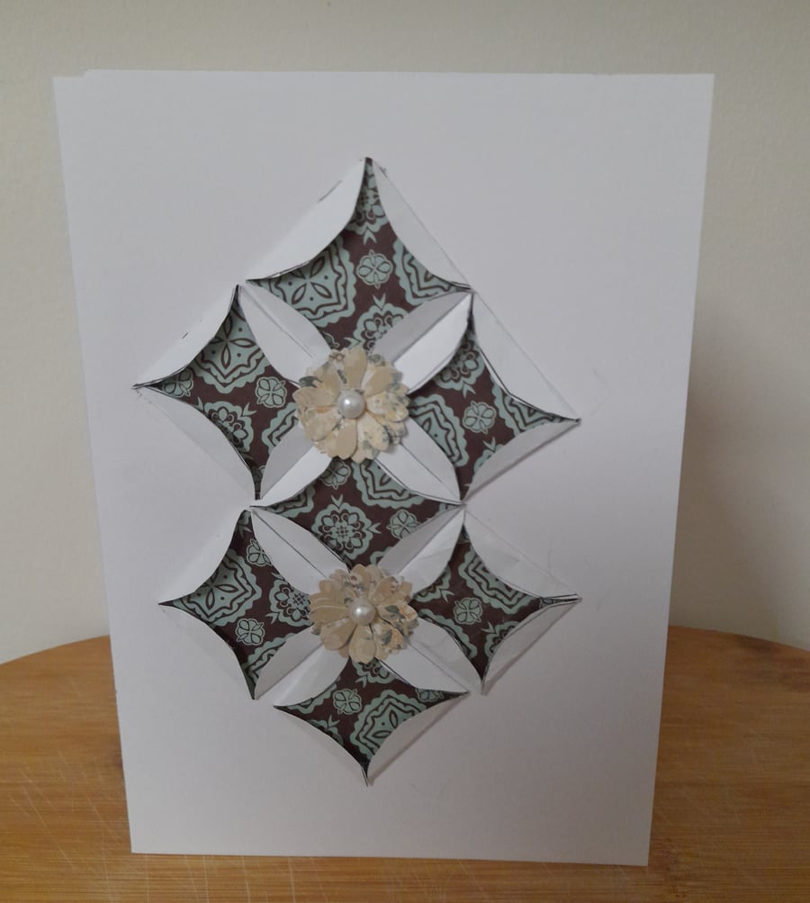 BLANK HANDMADE ORIGAMI PATTERNED CARD.