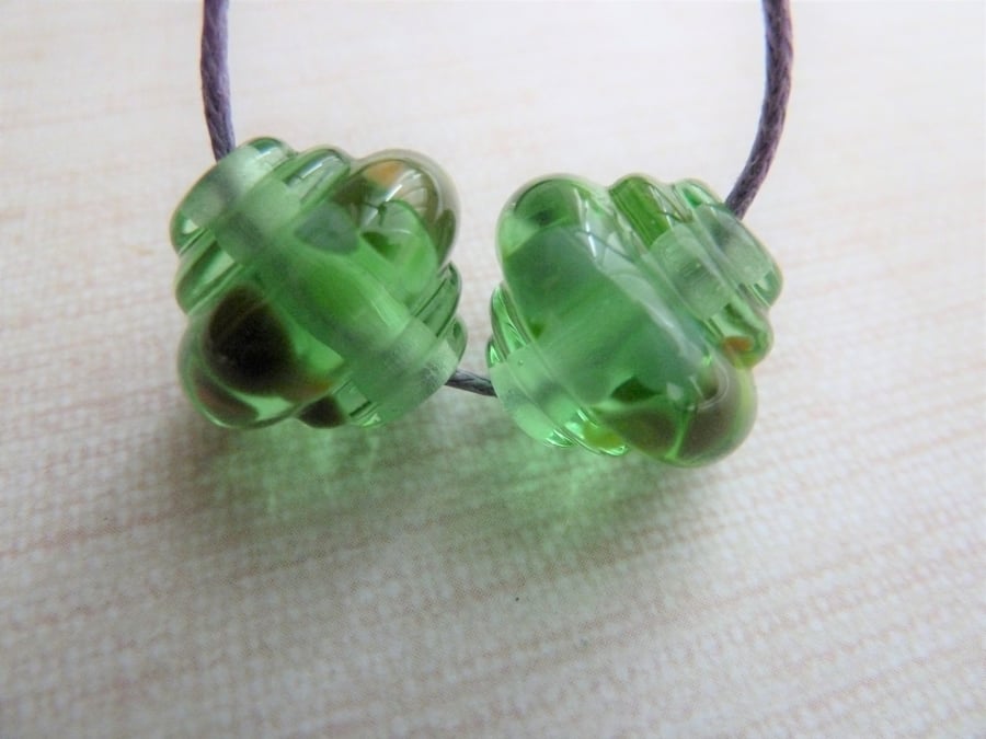 green frit ornate lampwork glass bead pair