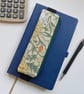 Elasticated pencil case for cover of notebook floral orange and green 
