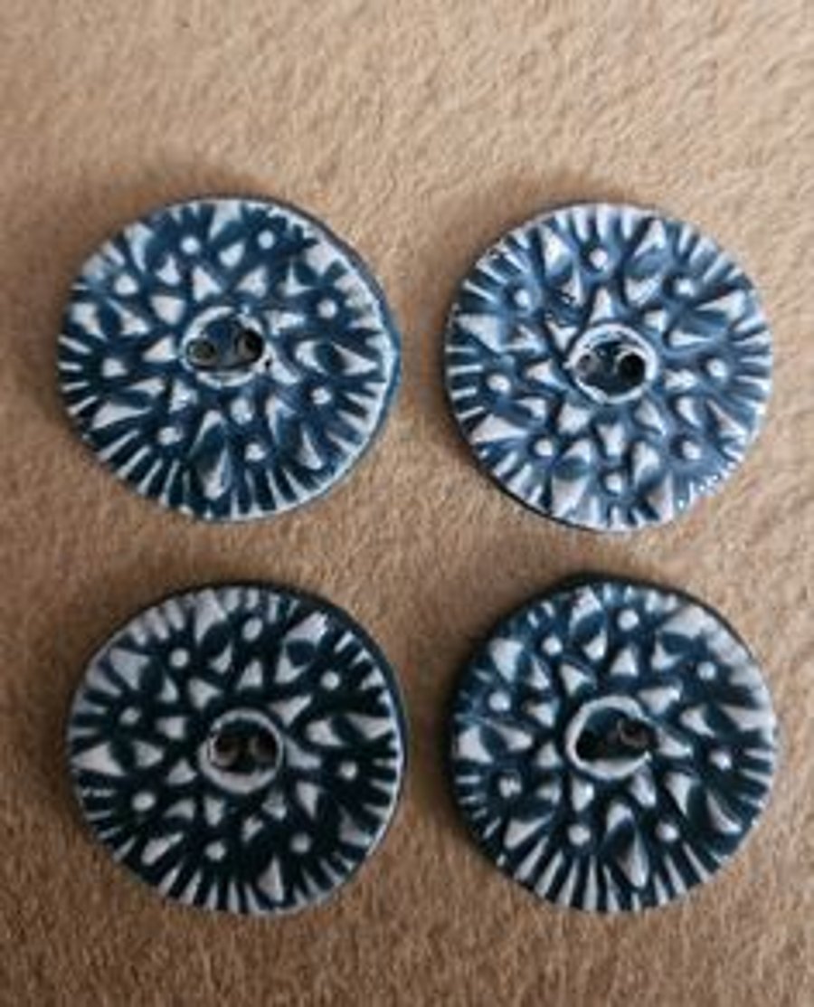 A Set of Four Teal Textured Ceramic Buttons