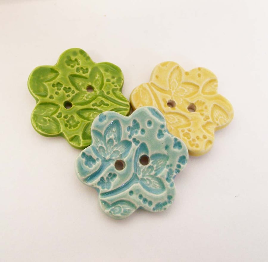 Set of three handmade ceramic flower buttons