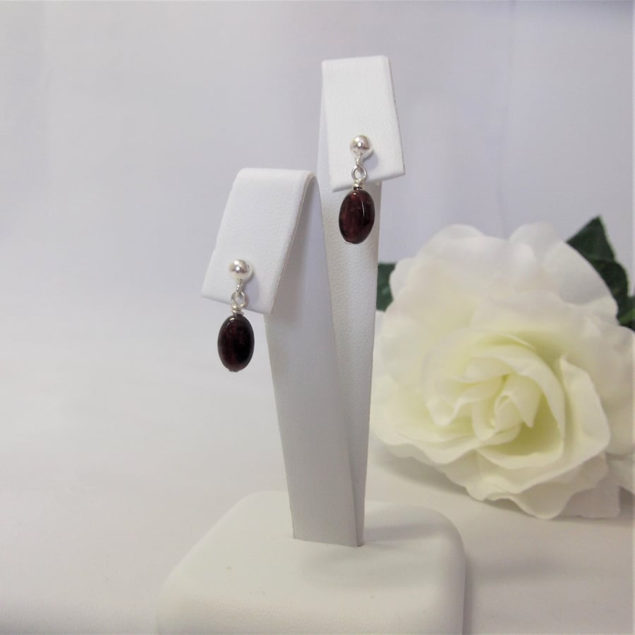 Garnet gemstone stud earrings January birthstone base chakra