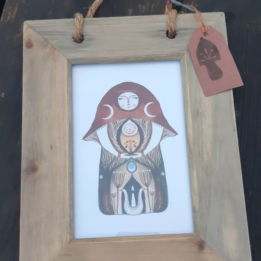Mushroom totem small framed print