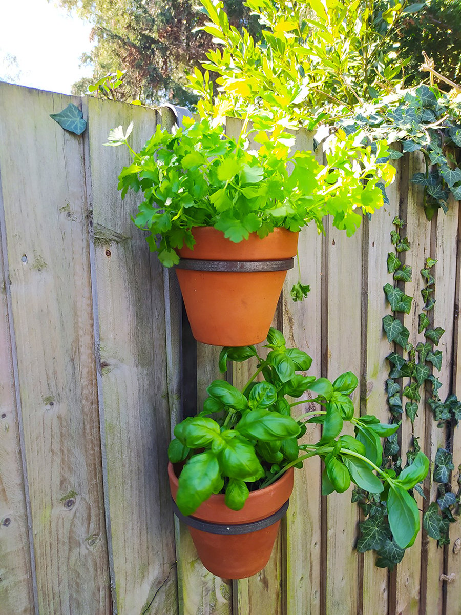 Hand made double 'Fence Hanging' 6" terracotta pot holder