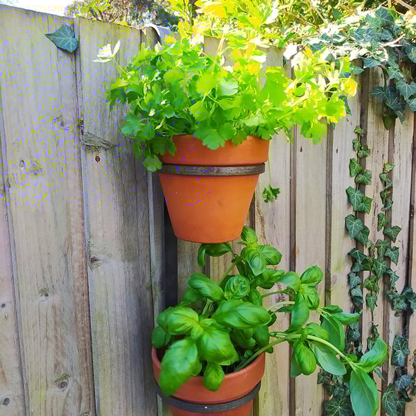 Hand made double 'Fence Hanging' 6" terracotta pot holder