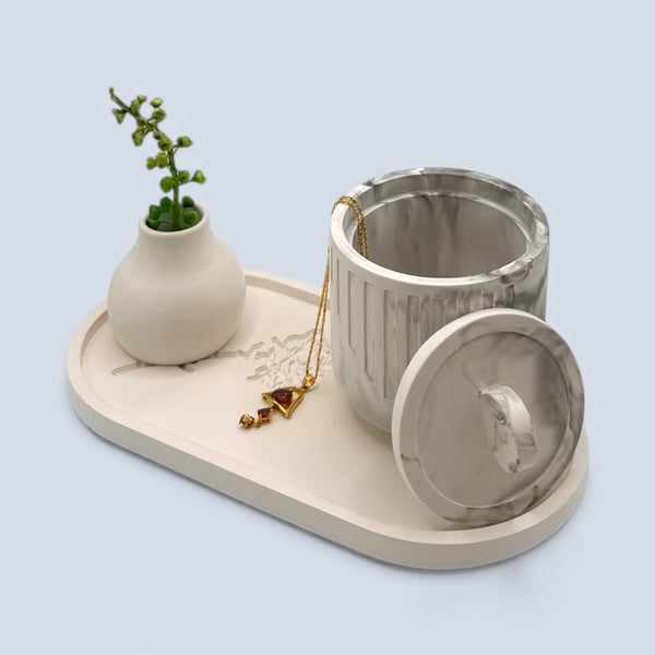 Black and grey marbled jewellery box with disc handle