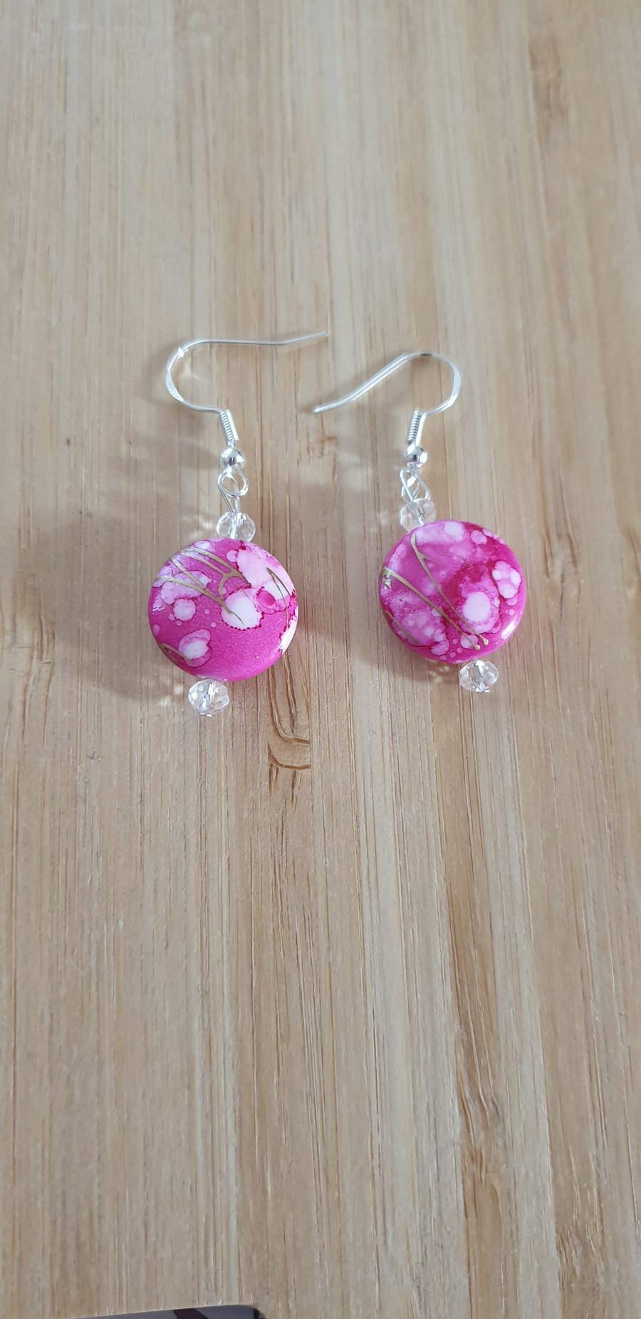 Pink round earrings