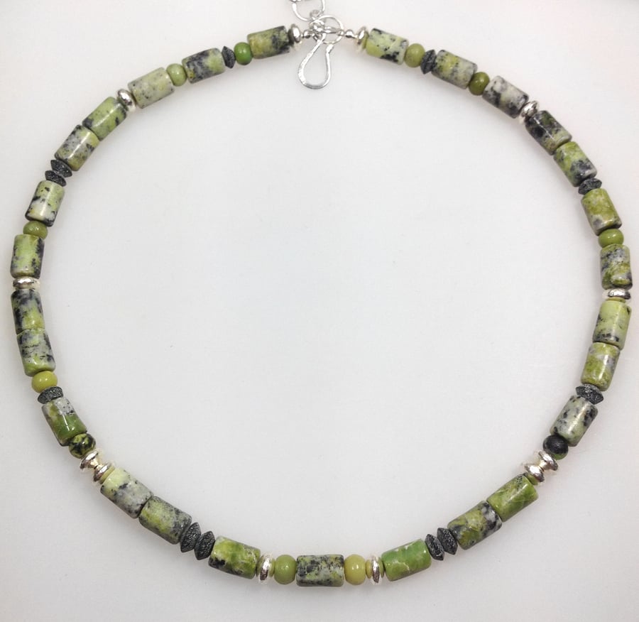 Sterling silver and serpentine bead necklace.
