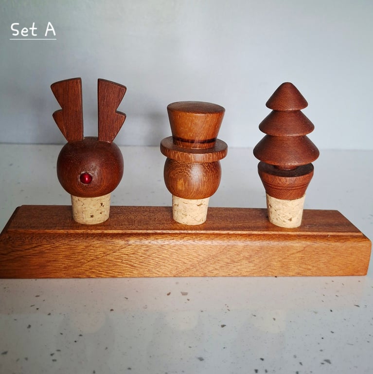 Trio of bottle toppers in a stand - great Christmas gift