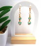 Green and White Floral Ceramic Earrings - Image 4