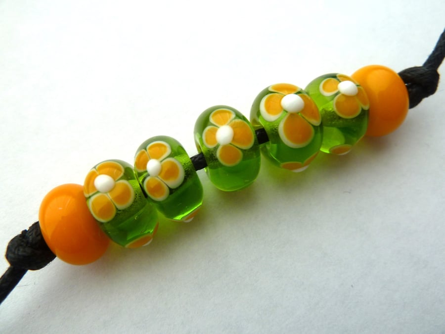 green and yellow flower beads