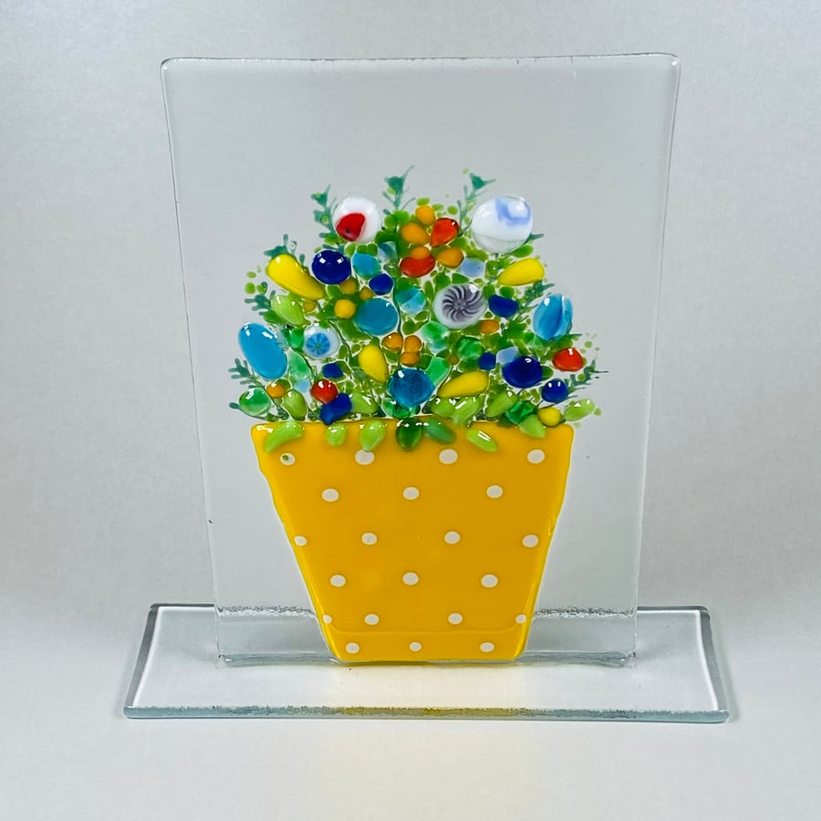 Flower pot ornament in fused glass.