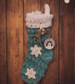 Teal Crochet Christmas Stocking with Snowflakes and Penguin Tag - Image 1