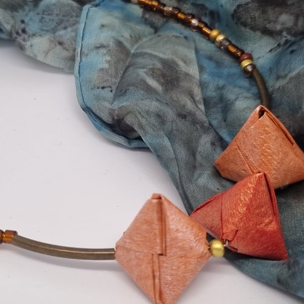 Handmade origami necklace: pearlescent paper in shades of brown and small beads 