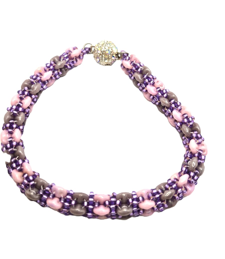 Ladies handmade pink and purple beaded bracelet
