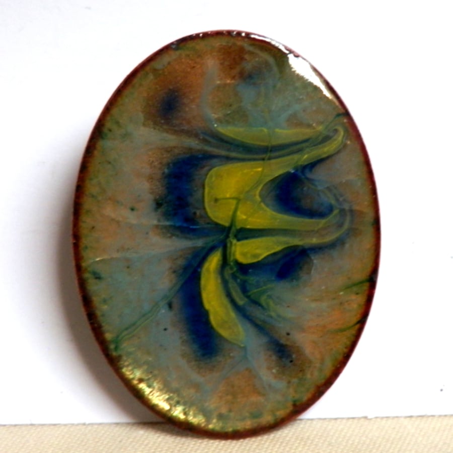 oval scrolled blue and gold over pale turquoise on clear enamel - brooch